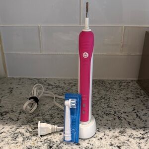 Oral B Professional Care Electric Toothbrush with Charger and Brush Head